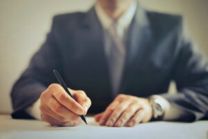A lawyer in Long Island handling a trusts and wills case for his client.