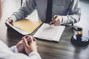 A probate lawyer in long island assisting a client