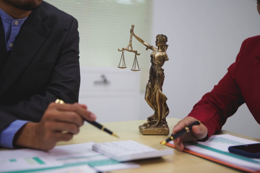 Close-up of legal consultation scene symbolizing guidance from a trusted Long Island Medicaid attorney